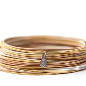 Emerson and Olivier “DIA” warm mixed metal bracelets set of 25